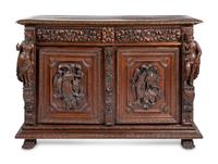 A Continental Carved Oak Cabinet