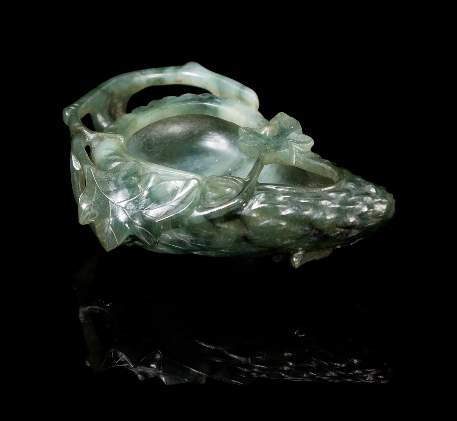 A Chinese Jadeite Scholar’s Brushwasher 19TH CENTURY Length 3 inches. — 19TH CENTURY