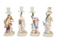 A Set of Meissen Porcelain Four Seasons Candlesticks