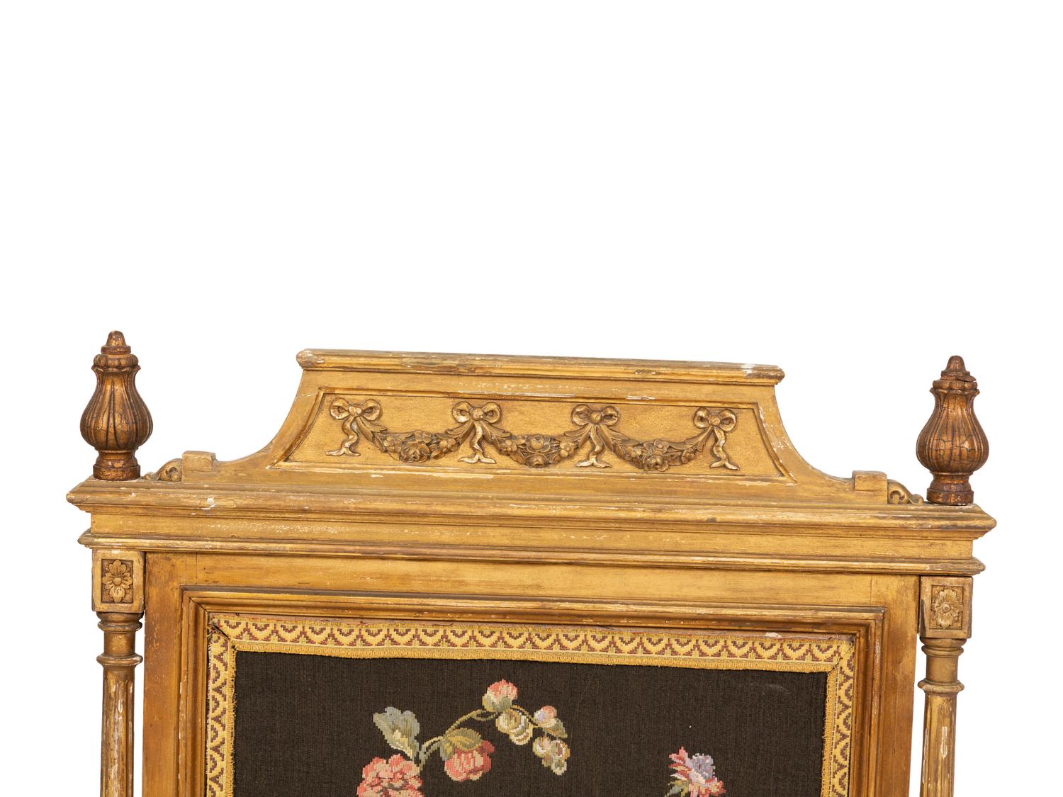 A Louis XVI Style Giltwood Fire Screen with Needlework Panel