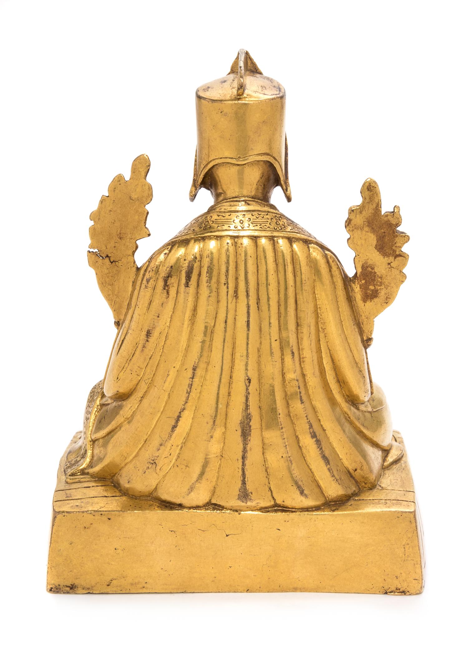 A Sino-Tibetan Gilt Bronze Figure of Lama Height 7 1/2 inches. — 19TH CENTURY