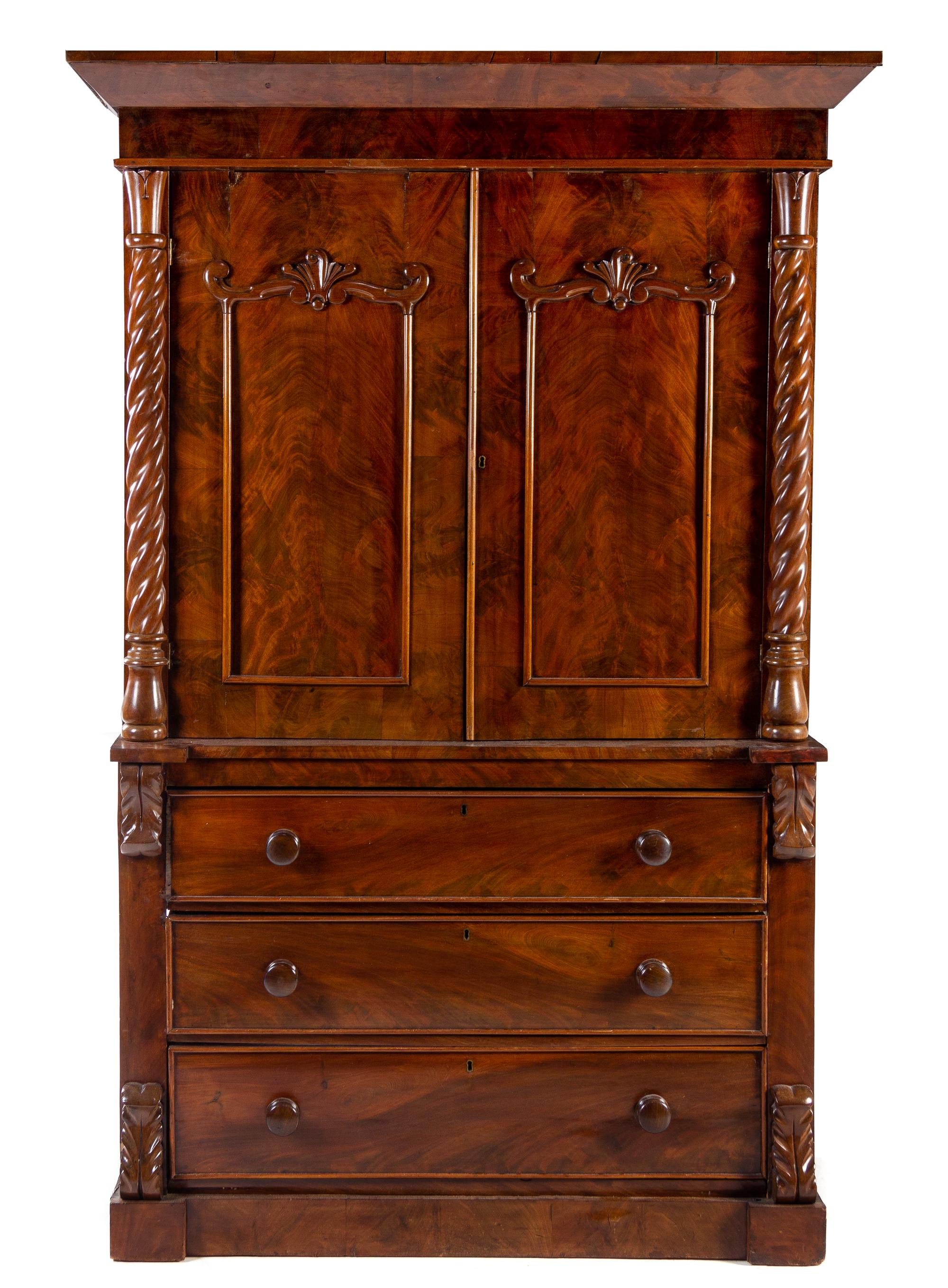 A Viennese Mahogany Linen Press Height 77 3/4 x width 52 x depth 23 1/4 inches. — 19TH CENTURY