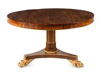 A Regency Parcel Gilt Rosewood Tilt-Top Table