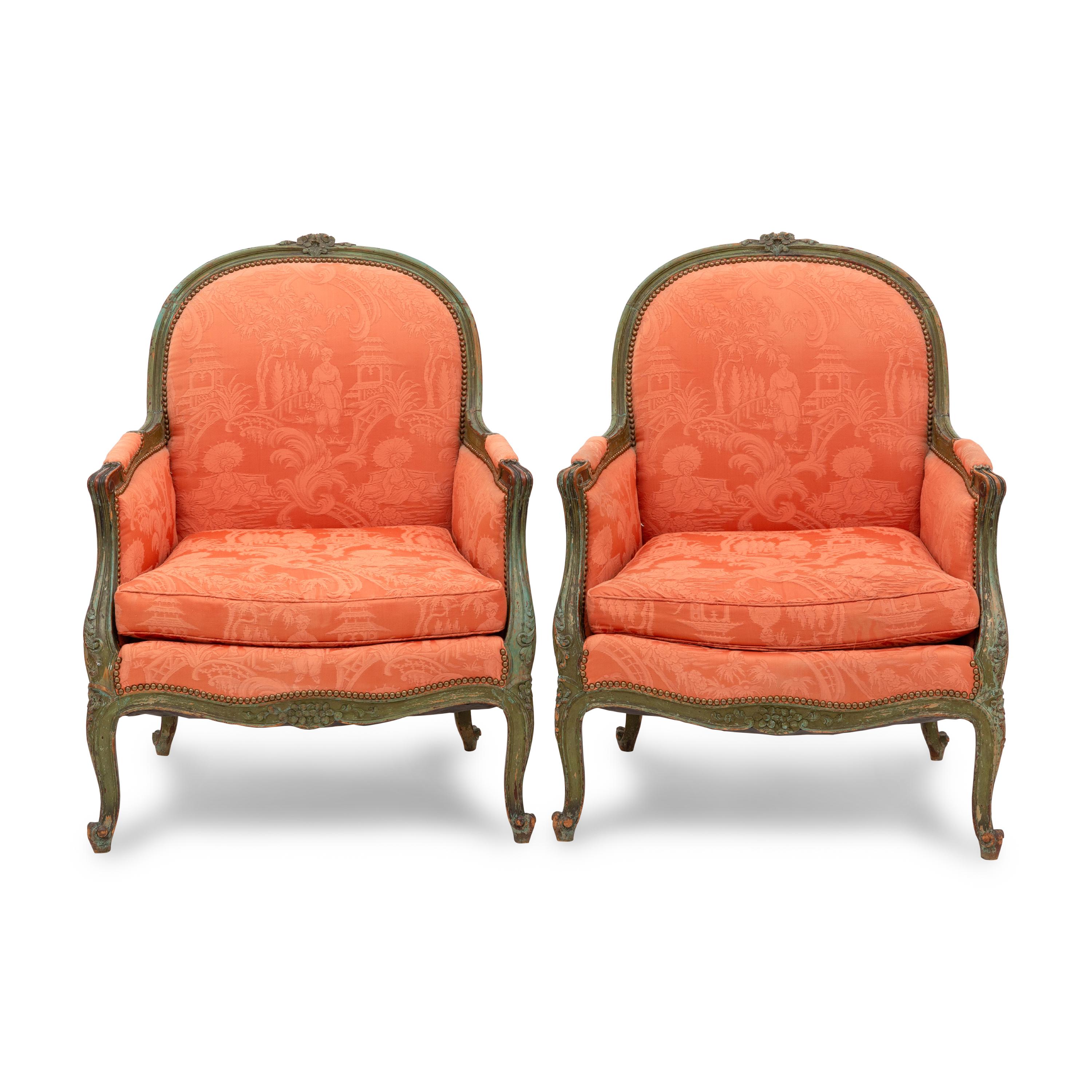 A Pair of Louis XV Green Painted Bergères