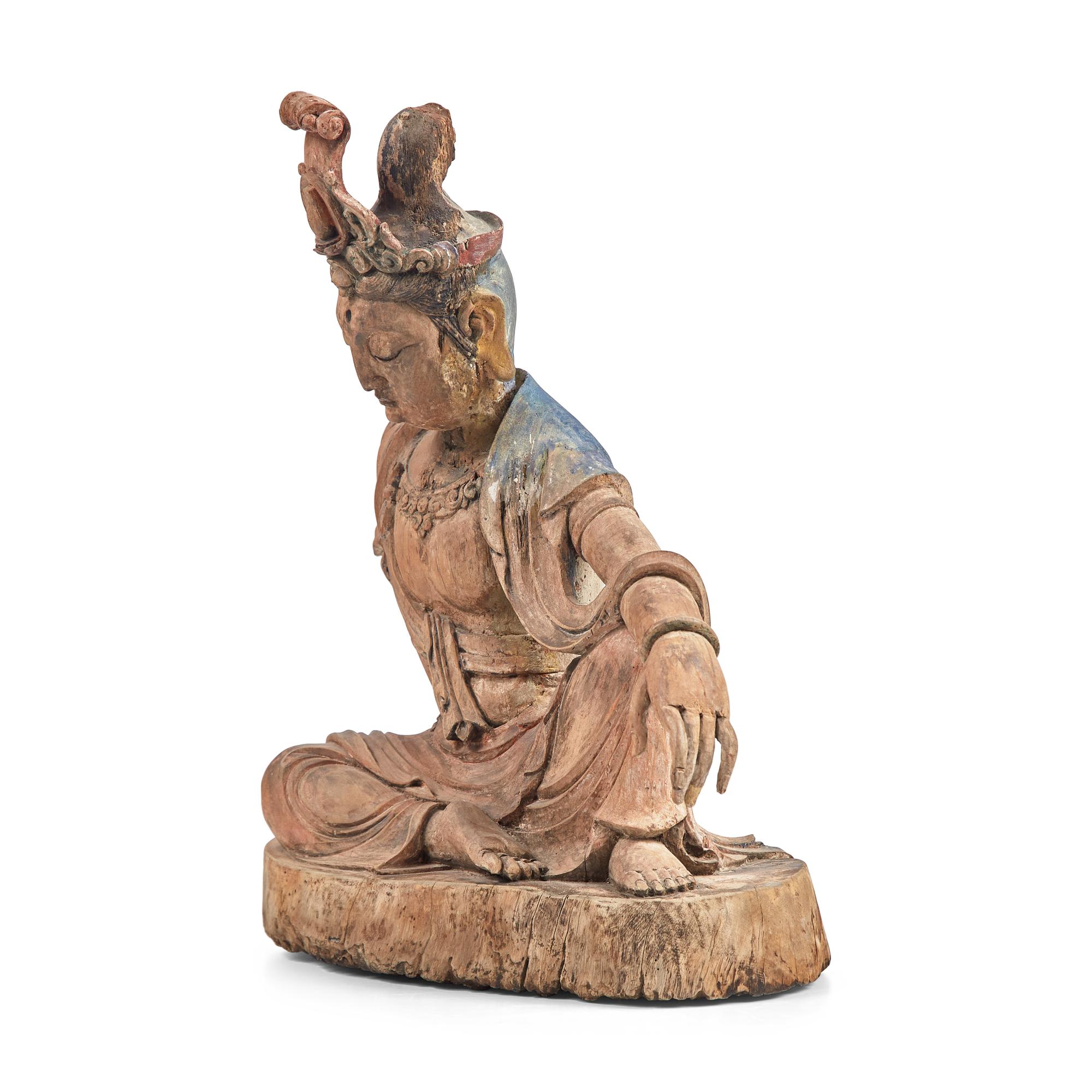 A Chinese Carved and Painted Wood Figure of Guanyin, Ming Dynasty or Earlier 明或更早 木雕彩繪水月觀音