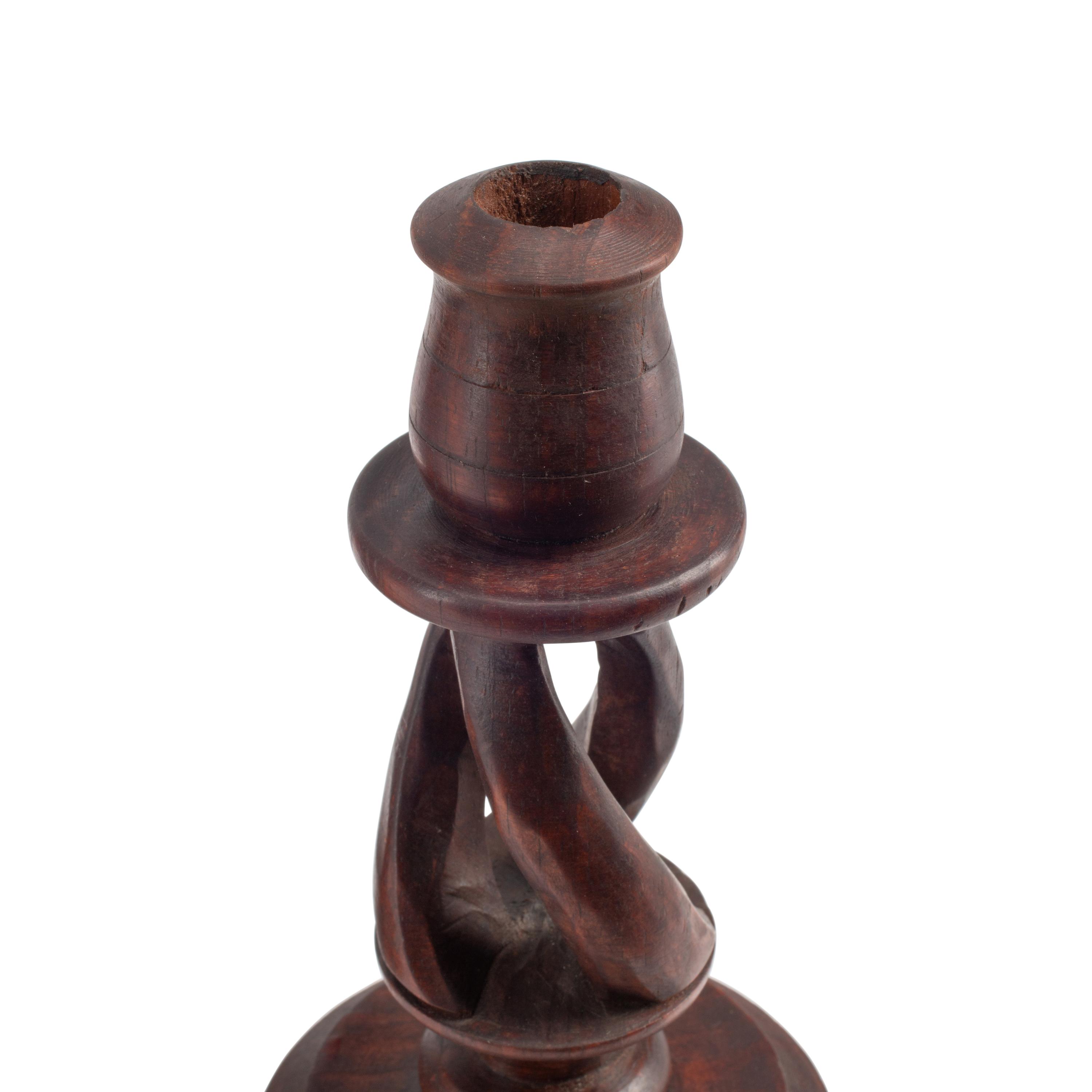 A Group of Seven Turned Wood Candlesticks