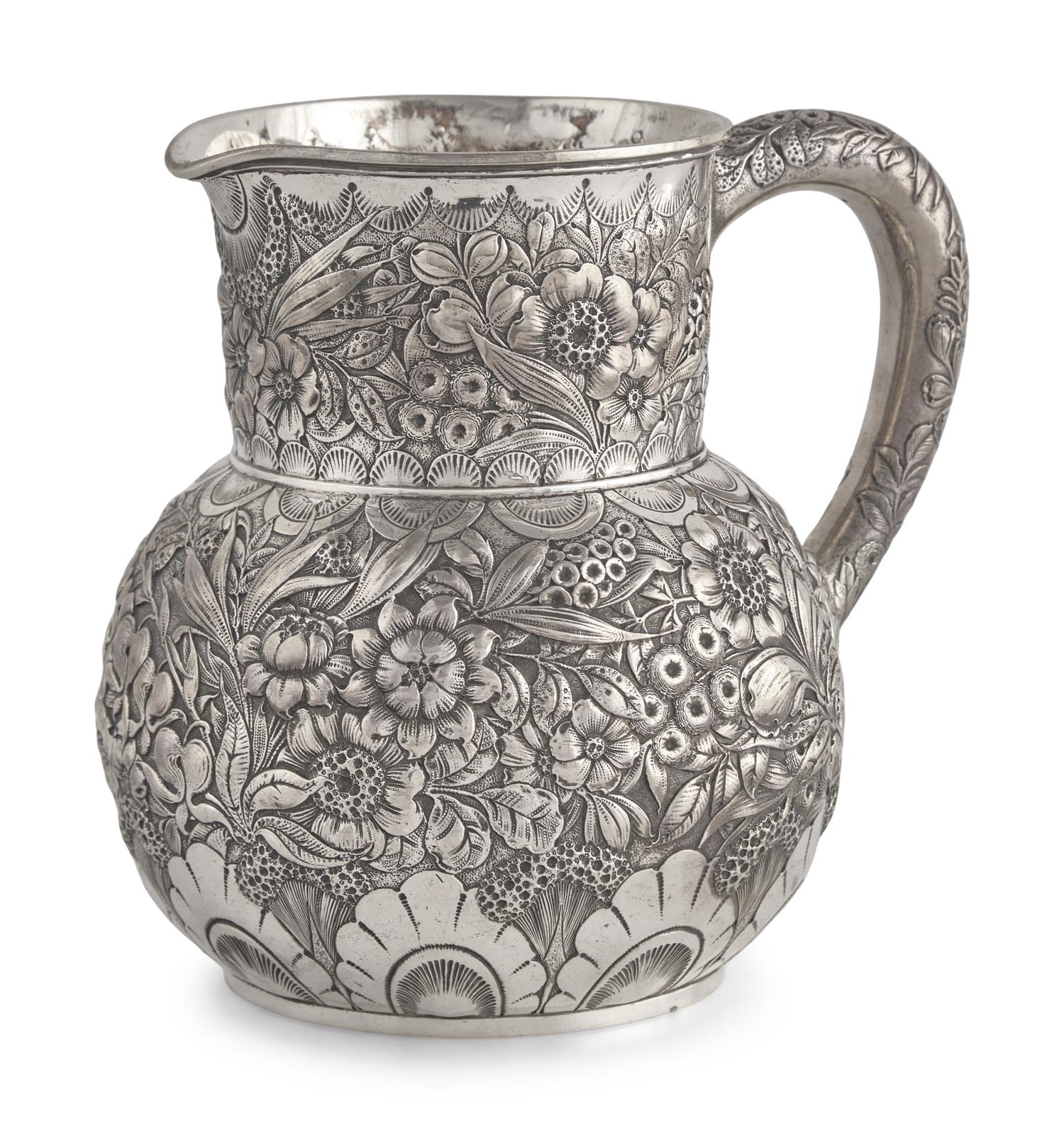 A Sterling Silver Floral Repousse Water Pitcher, Tiffany & Co., New York, NY, Circa 1880