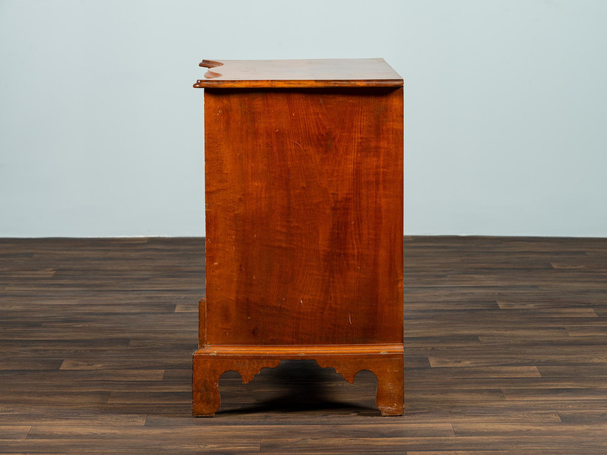 A Chippendale Style Tiger Maple Serpentine Chest of Drawers