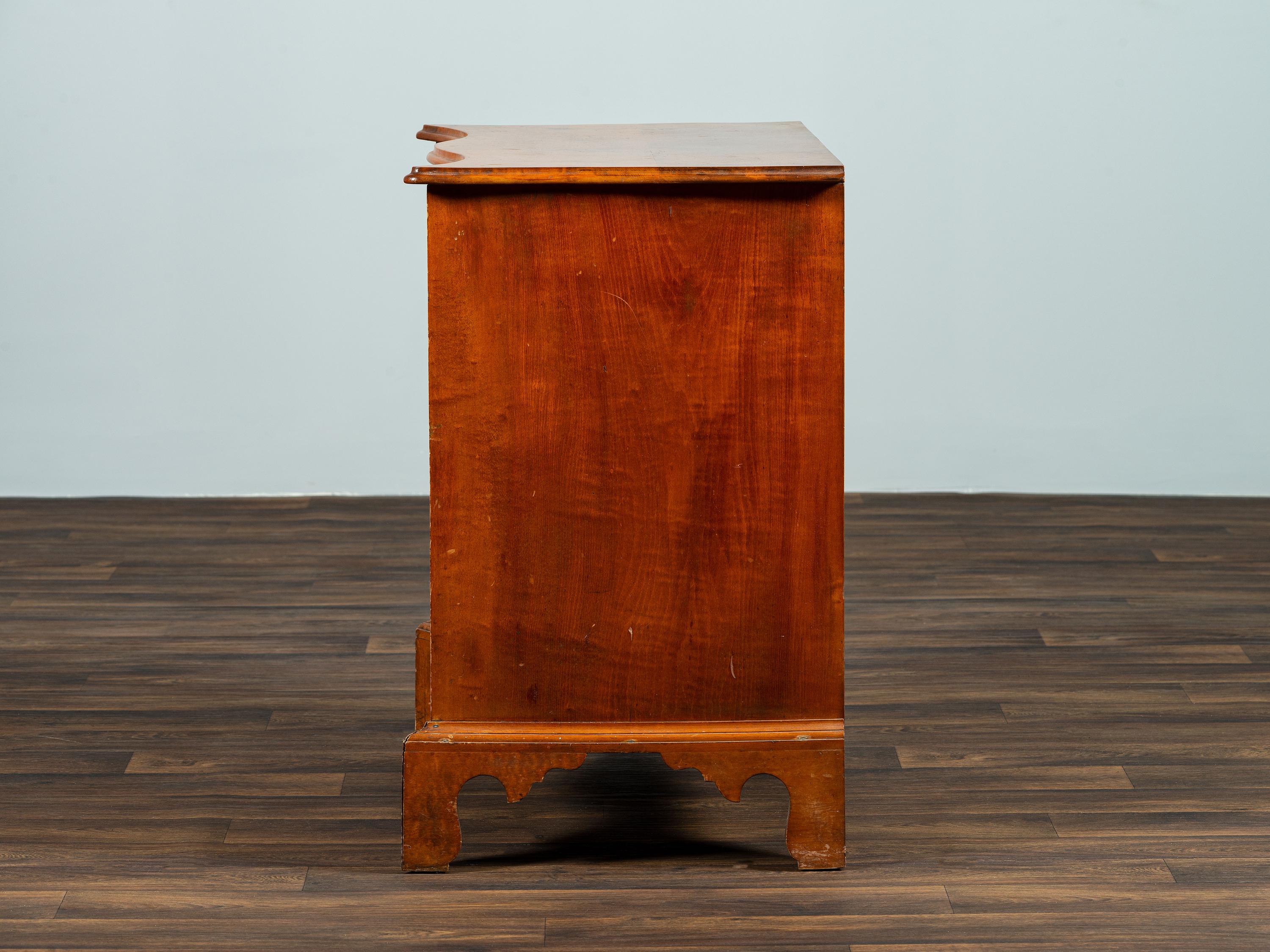A Chippendale Style Tiger Maple Serpentine Chest of Drawers