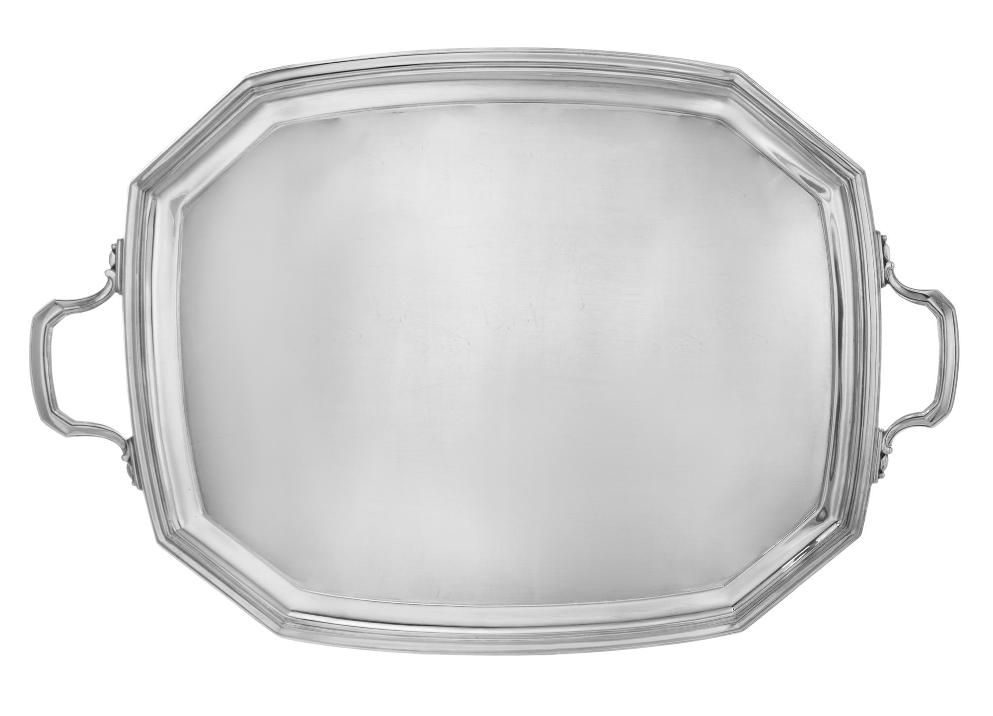 An Edwardian Silver Two-Handled Tray, Mappin and Webb, Ltd., Sheffield, London, 1929, of rectangular form with canted corners.