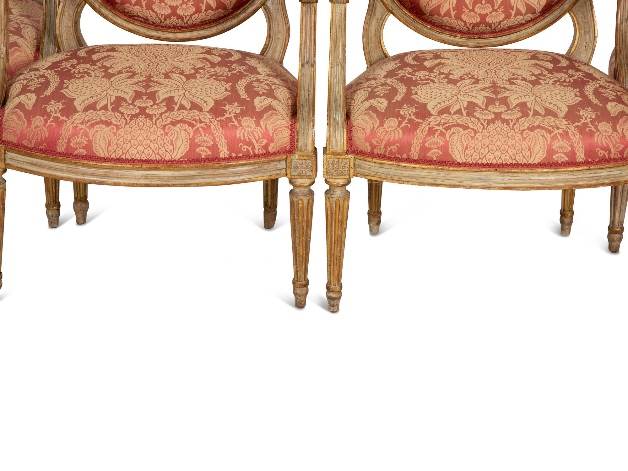 A Suite of Four Louis XVI Style Painted Fauteuils