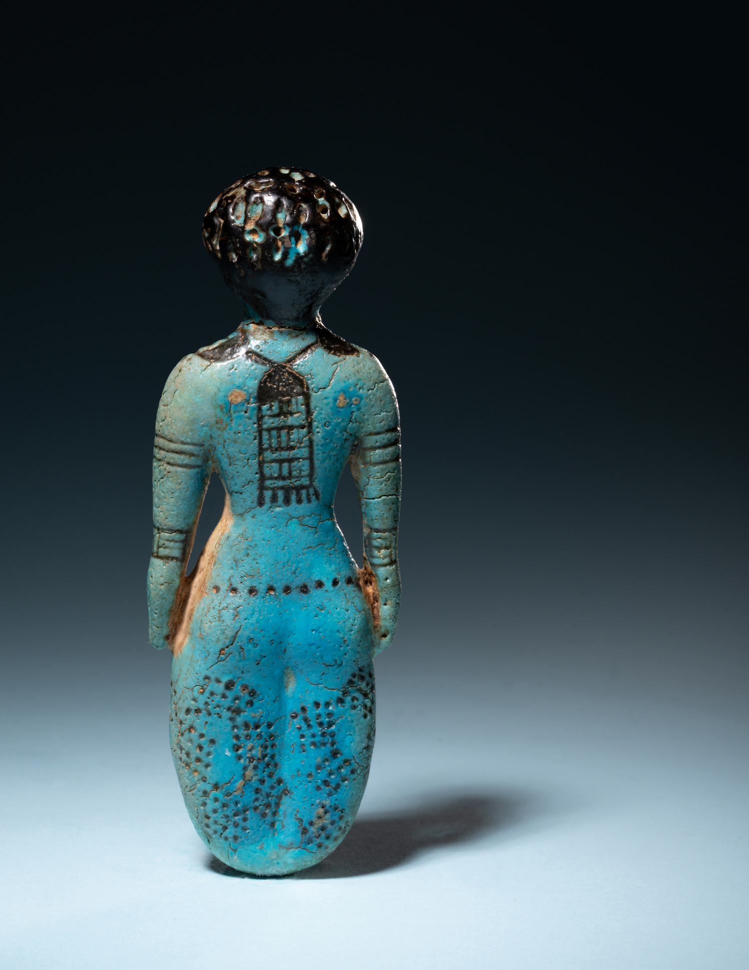 An Egyptian Faience Female Figure