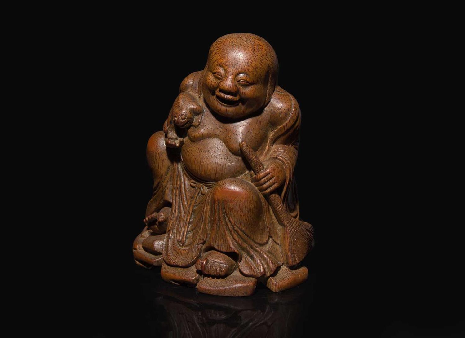 A Chinese carved bamboo figure of the immortal Liu Hai, Qing dynasty, 19th century or earlier 竹雕劉海 清 十九世紀或更早