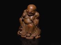 A Chinese carved bamboo figure of the immortal Liu Hai, Qing dynasty, 19th century or earlier 竹雕劉海 清 十九世紀或更早