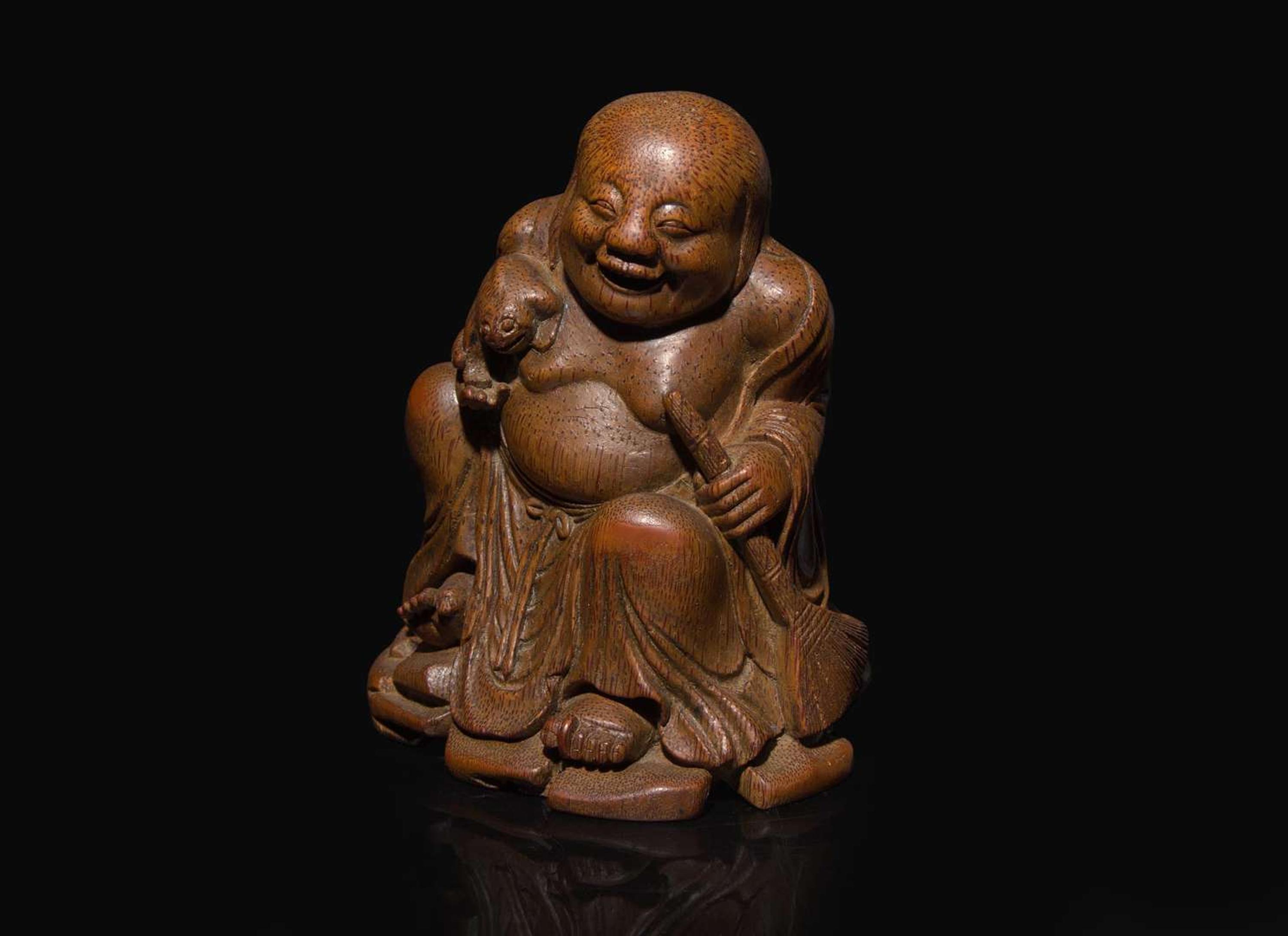A Chinese carved bamboo figure of the immortal Liu Hai, Qing dynasty, 19th century or earlier 竹雕劉海 清 十九世紀或更早