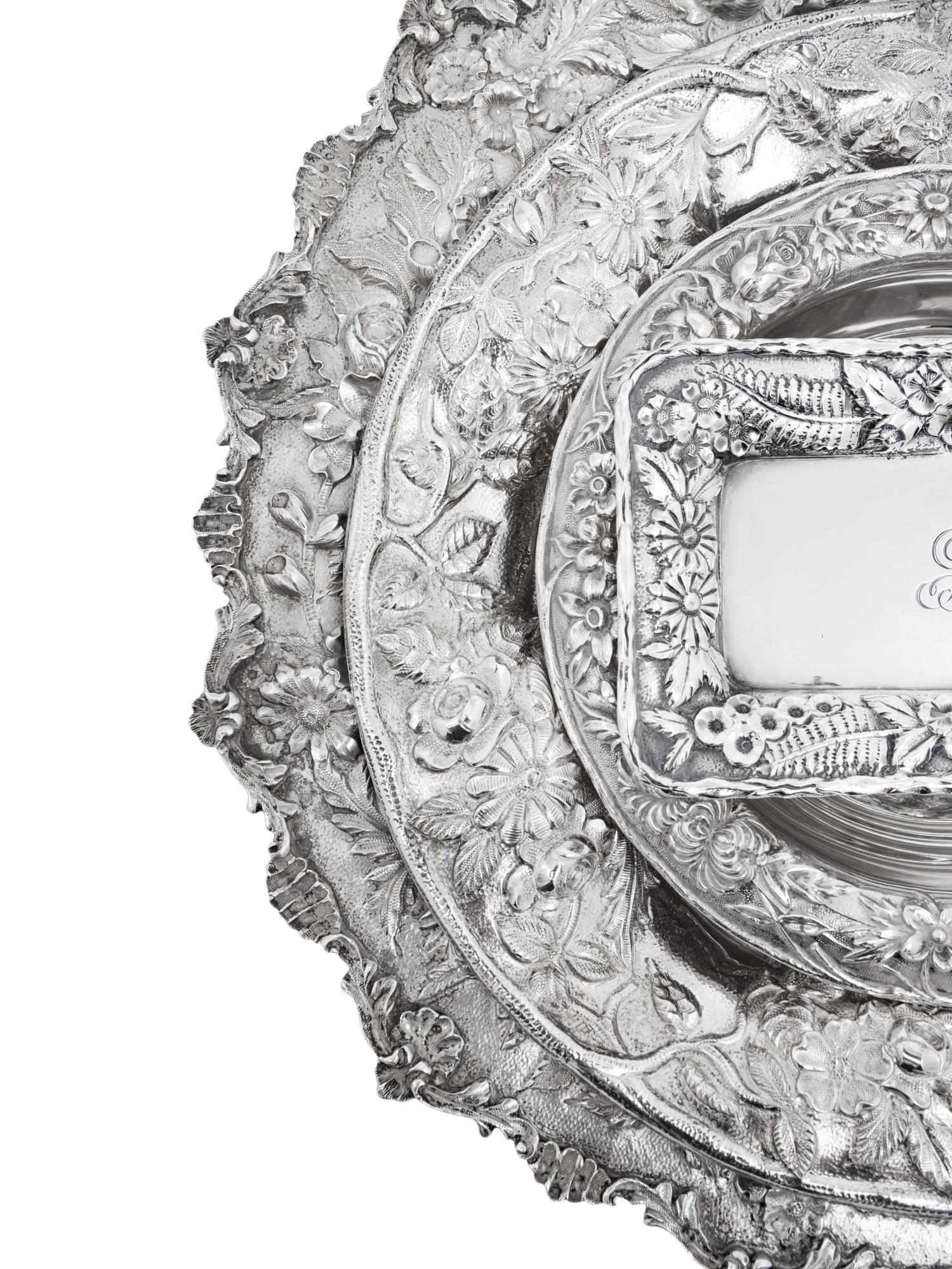 A Group of Four S. Kirk and Son Repousse Silver Table Articles