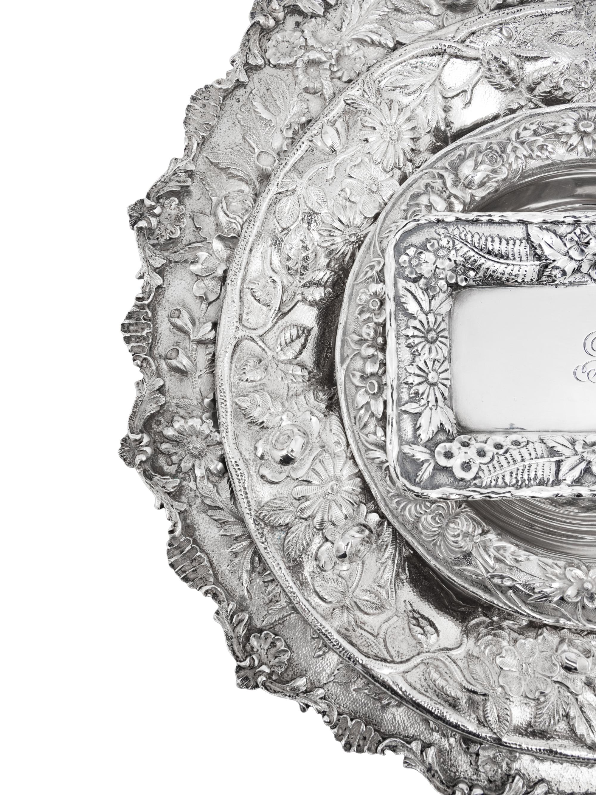 A Group of Four S. Kirk and Son Repousse Silver Table Articles