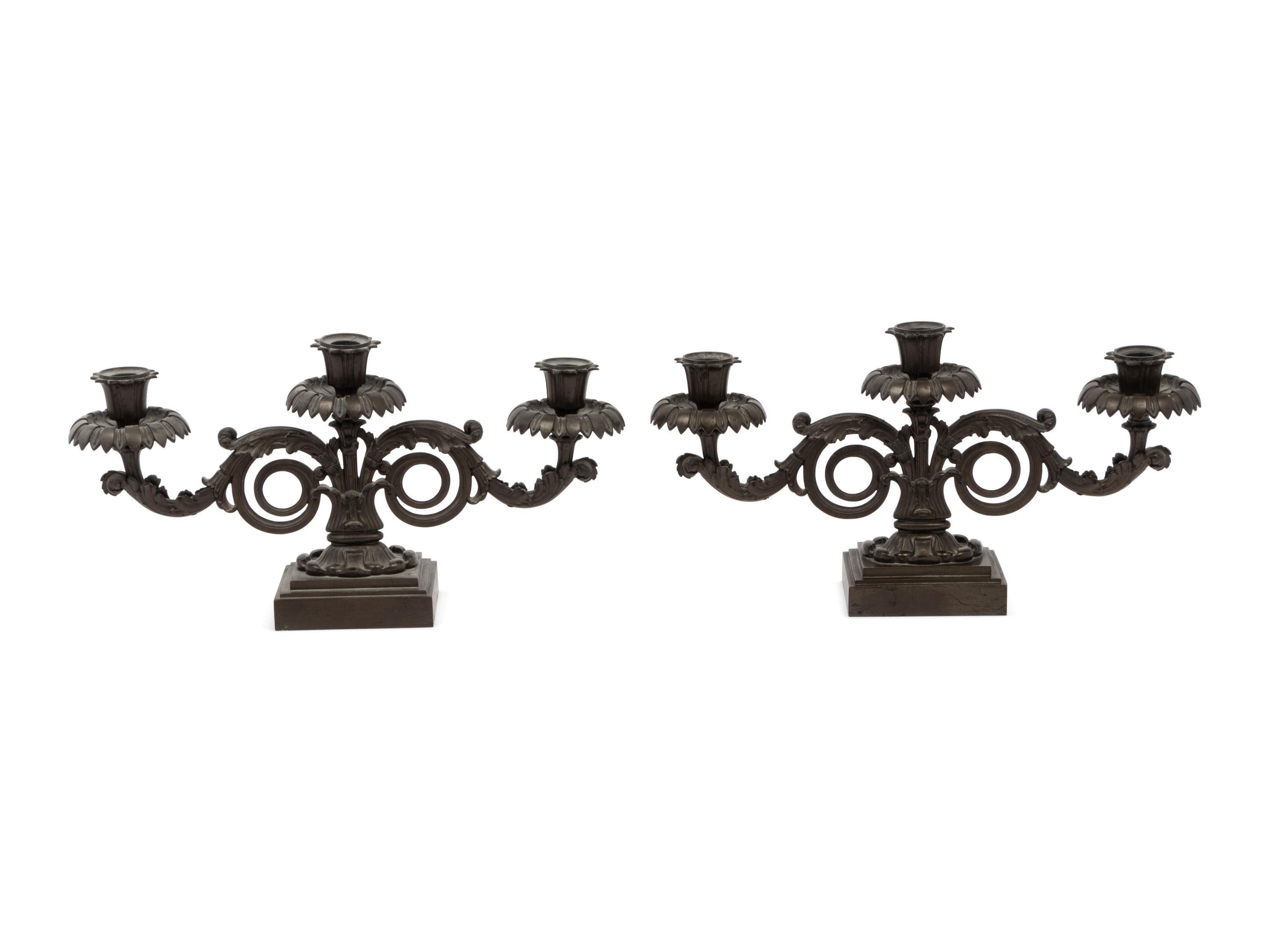 A Pair of Regency Bronze Three-Light Candelabra