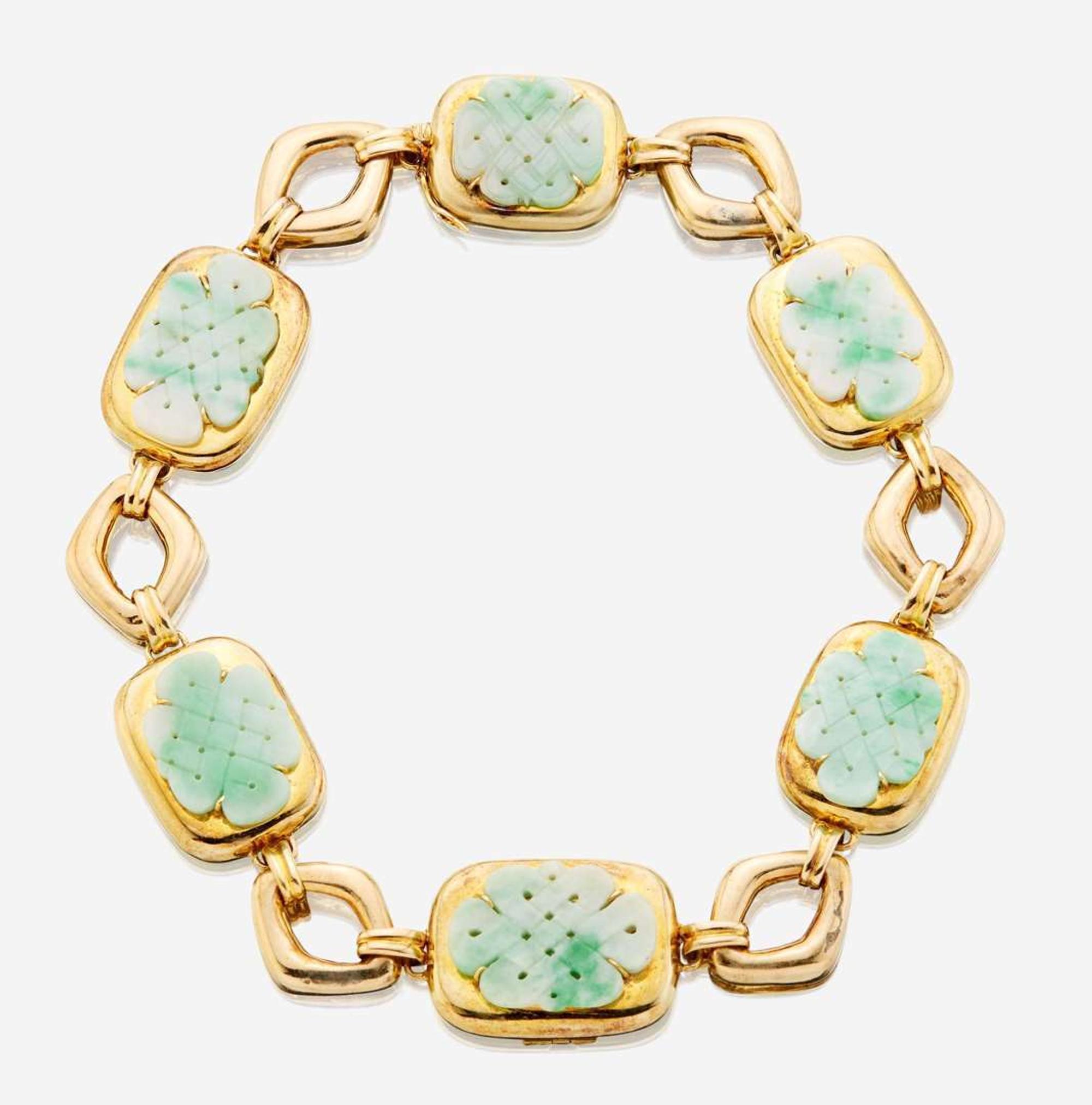 A gold and jade necklace