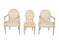 A Pair of Louis XVI Style Oval Back Painted Fauteuils and Matching Side Chair