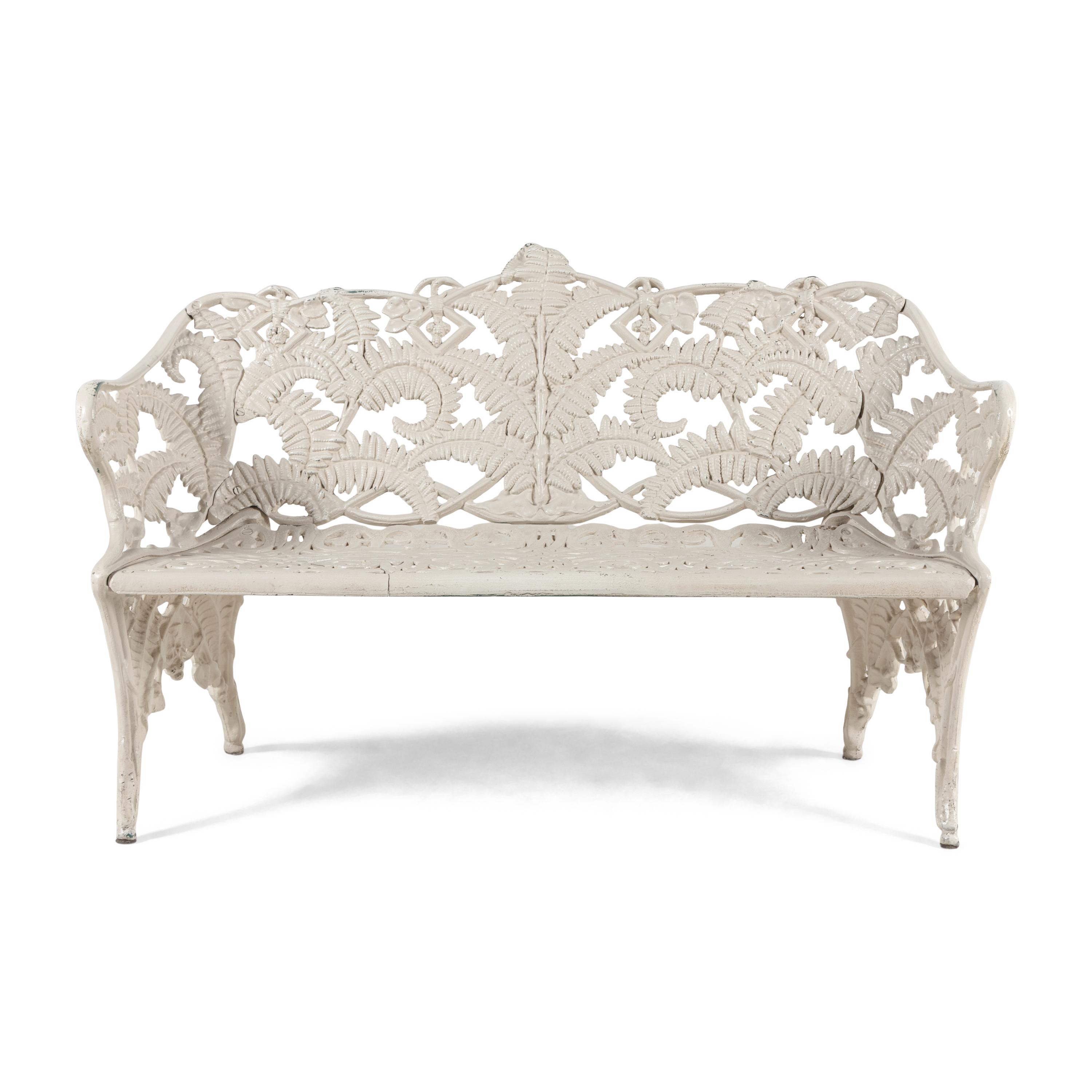 A Four-Piece Cast Iron Garden Seating Suite