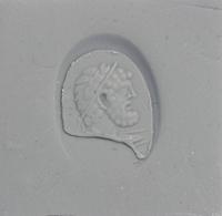 A Roman Carnelian Ring Stone with a Partial Portrait of a Roman Emperor — Set in a solid gold ring
