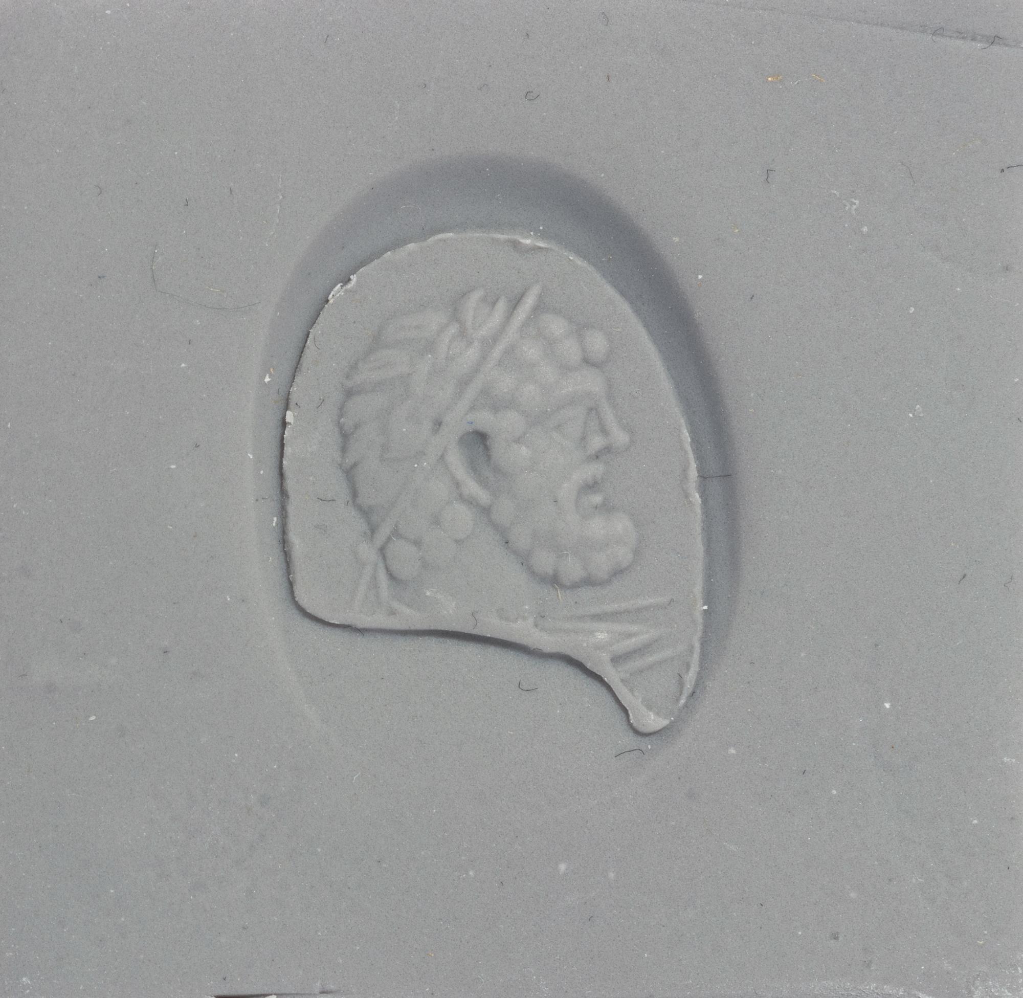 A Roman Carnelian Ring Stone with a Partial Portrait of a Roman Emperor — Set in a solid gold ring