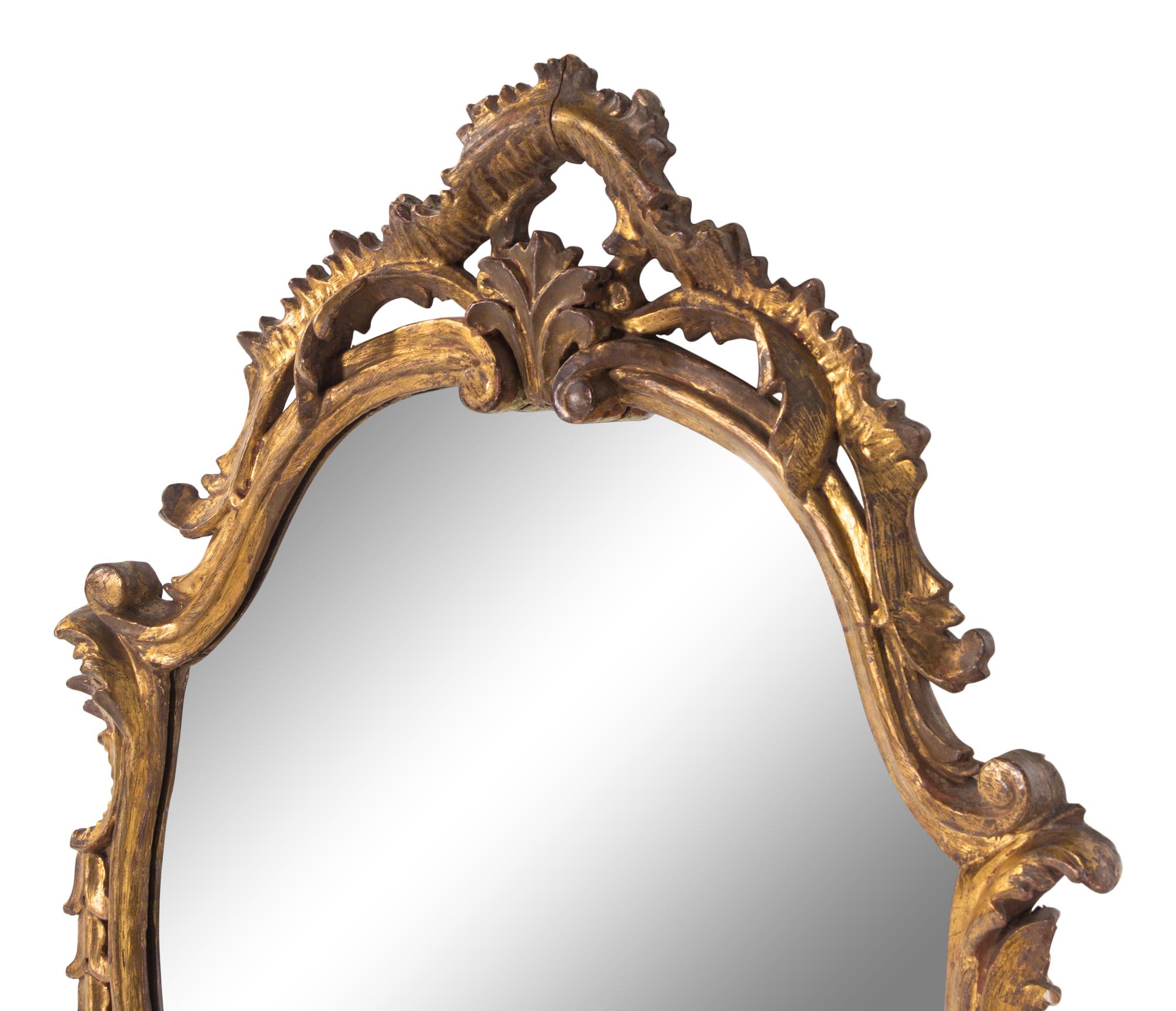 A Rococo Style Giltwood Mirror