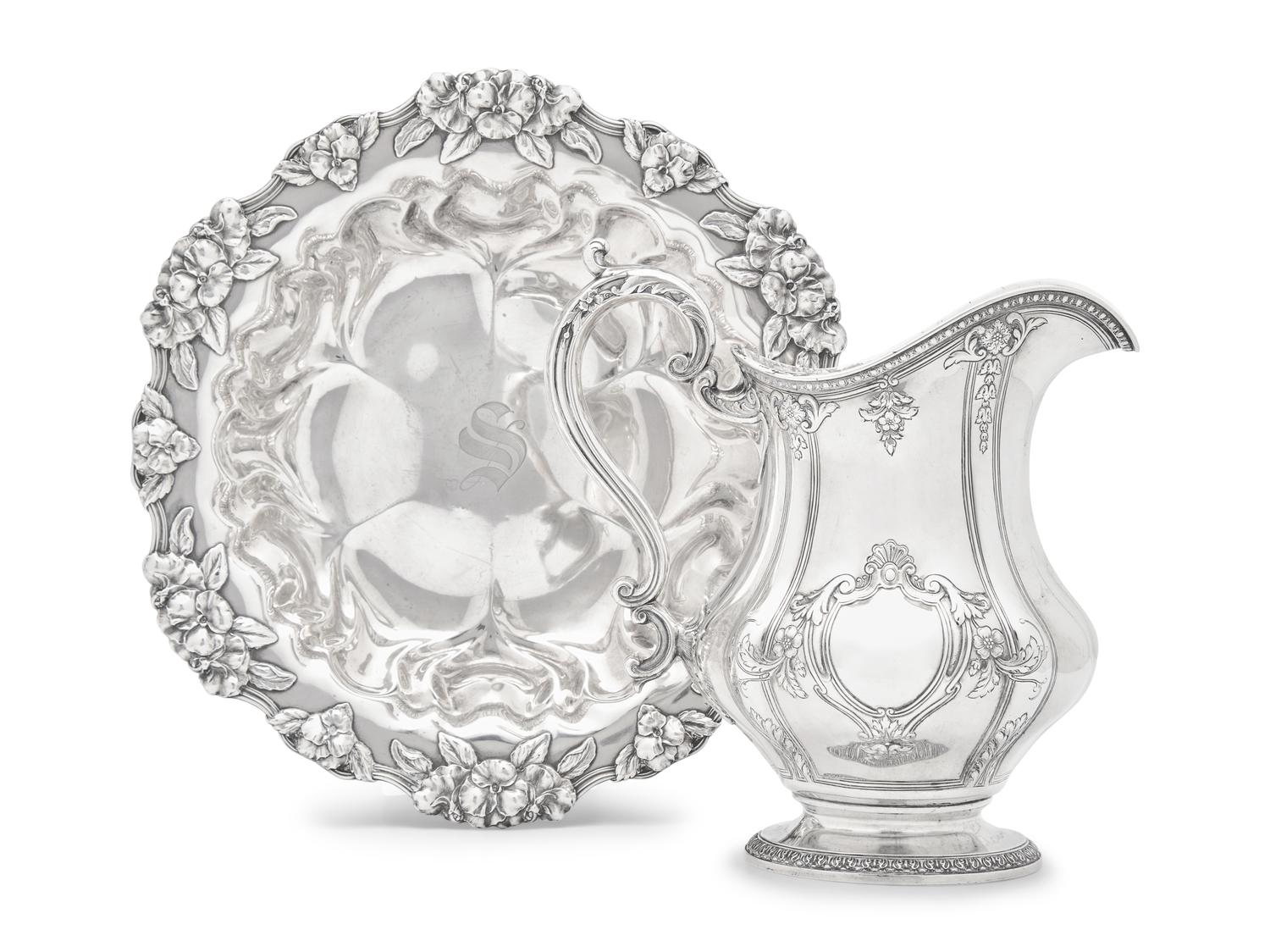 An American Silver Water Pitcher and Floral Repousse Bowl