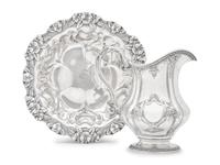 An American Silver Water Pitcher and Floral Repousse Bowl