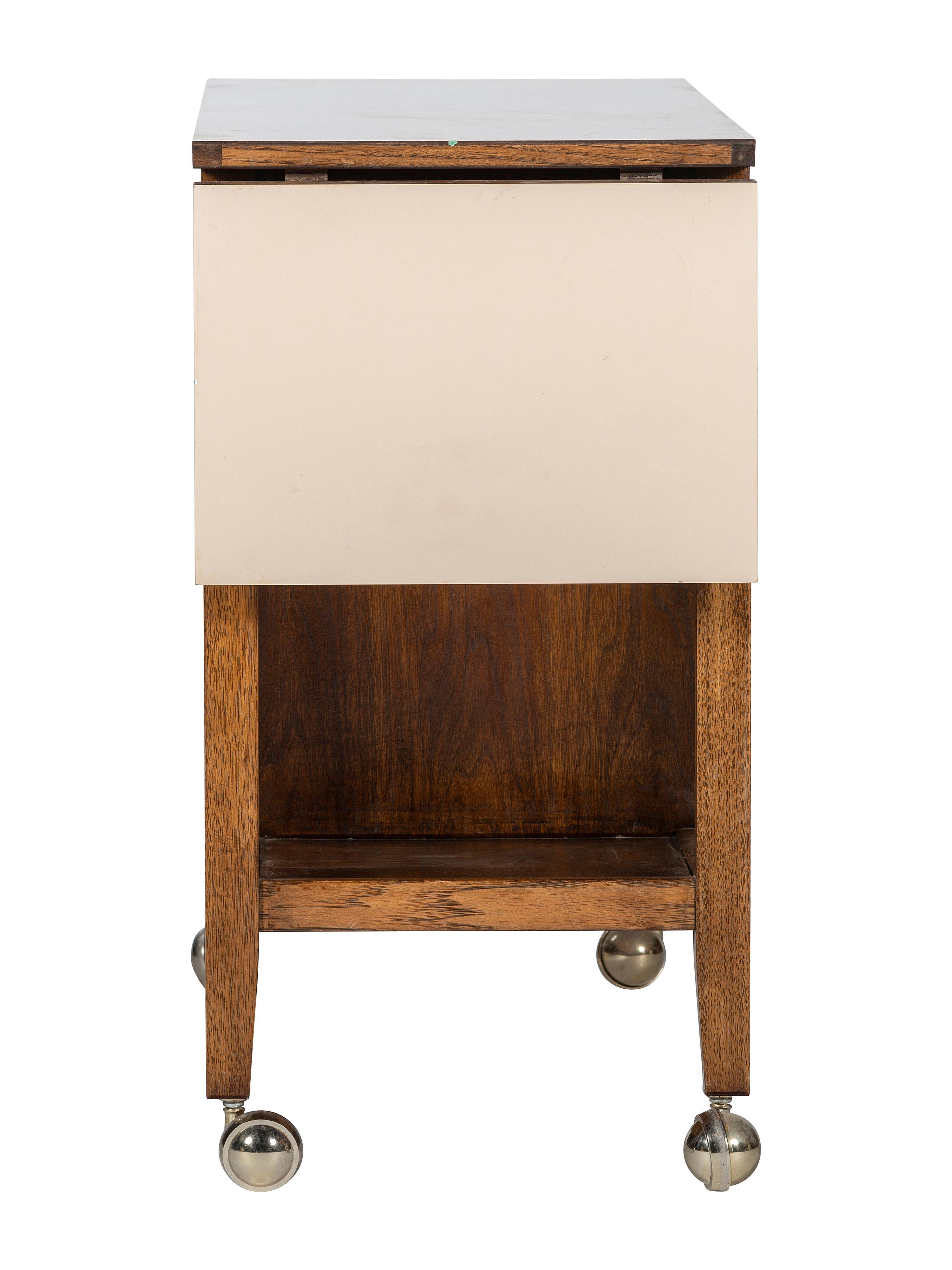 A Broyhill Brasilia Walnut Bar Cart