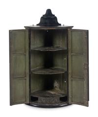 A George III Black Japanned Hanging Corner Cabinet