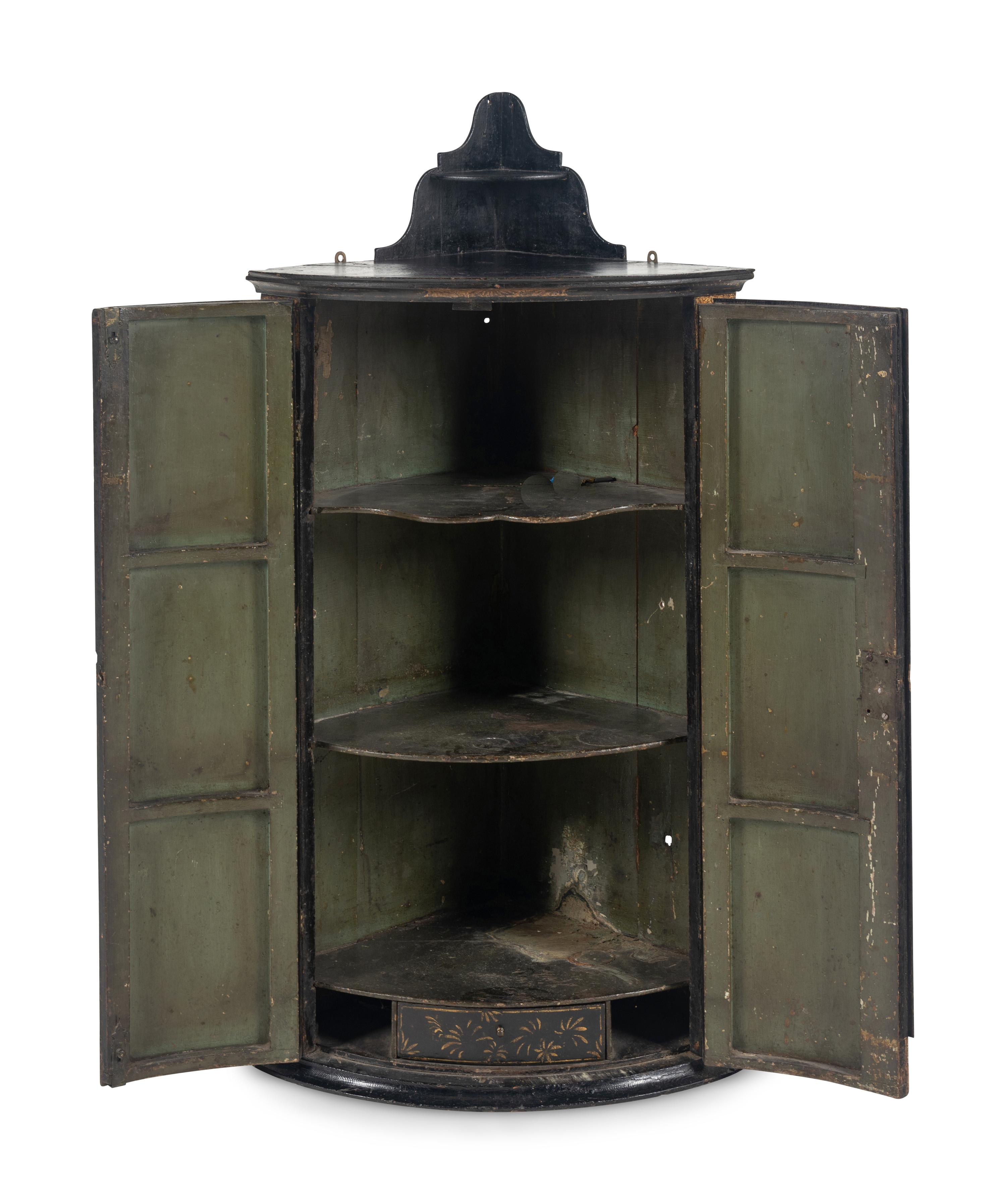 A George III Black Japanned Hanging Corner Cabinet