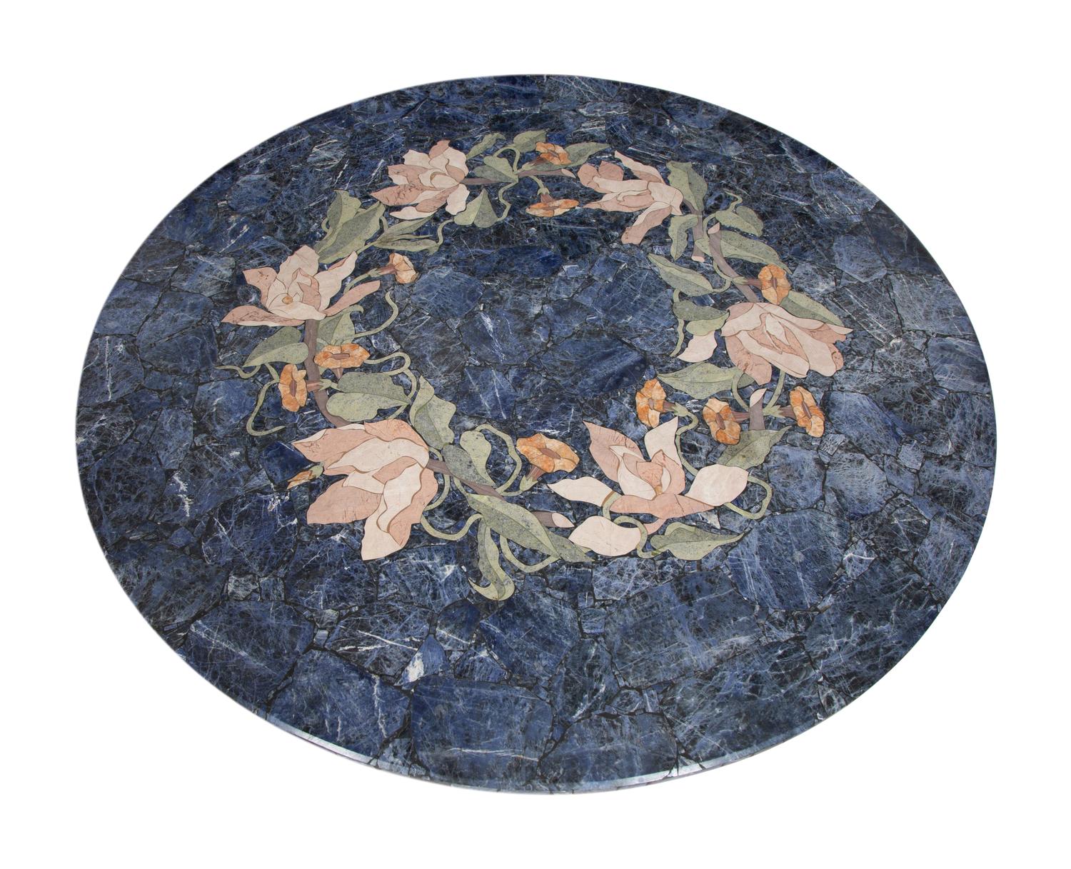 A Cast Stone and Pietra Dura Circular Dining Table