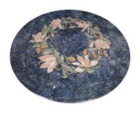 A Cast Stone and Pietra Dura Circular Dining Table