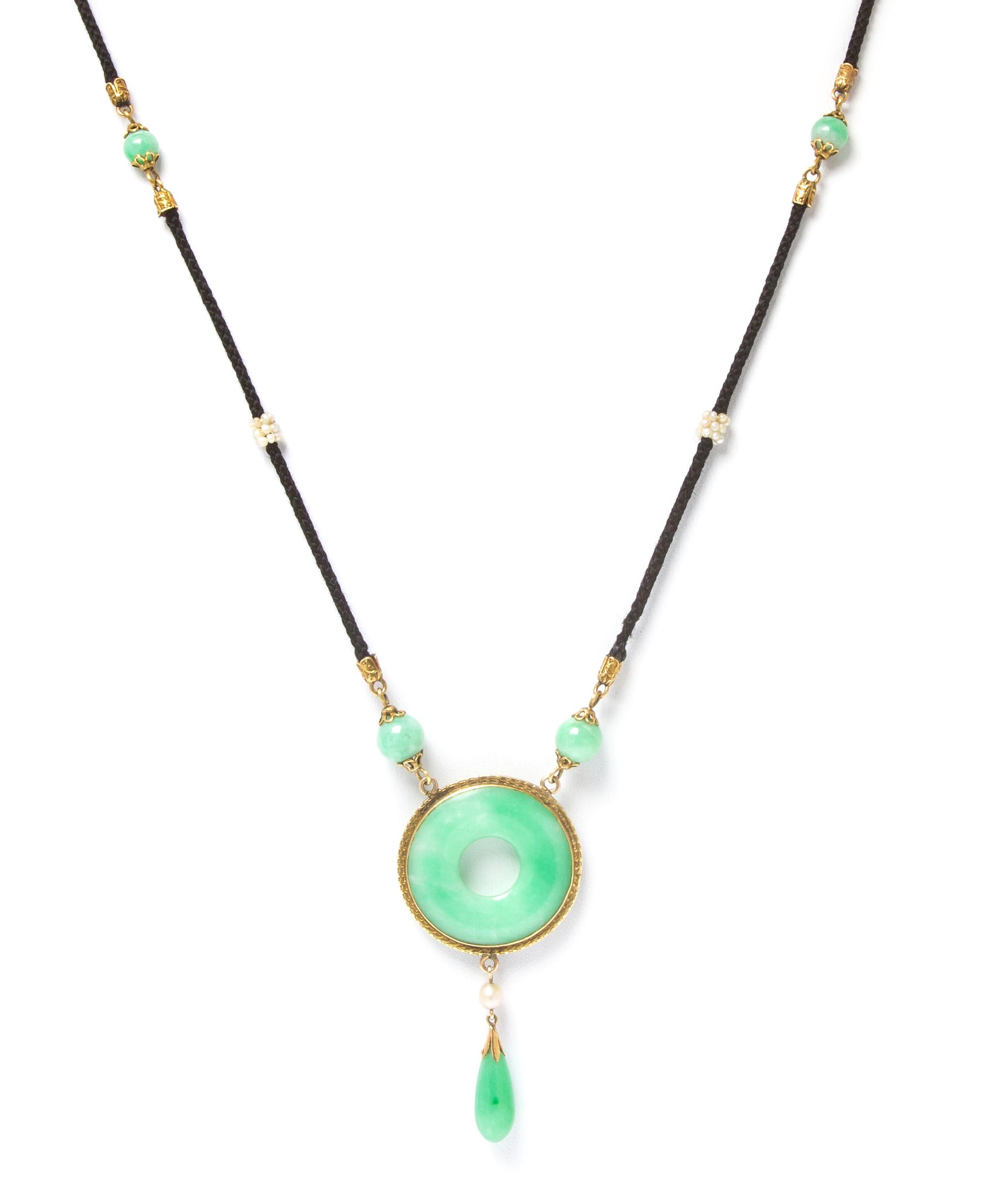 A Vintage 14 Karat Yellow Gold, Jade, Seed Pearl and Cord Necklace, 6.80 dwts.
