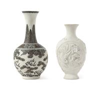 Two Biscuit Vases Height of taller 9 1/8 inches.