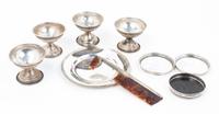 A Group of Nine Silver Articles, , comprising four dessert cups, three coasters, a small dish and a silver and tortoise shell comb.