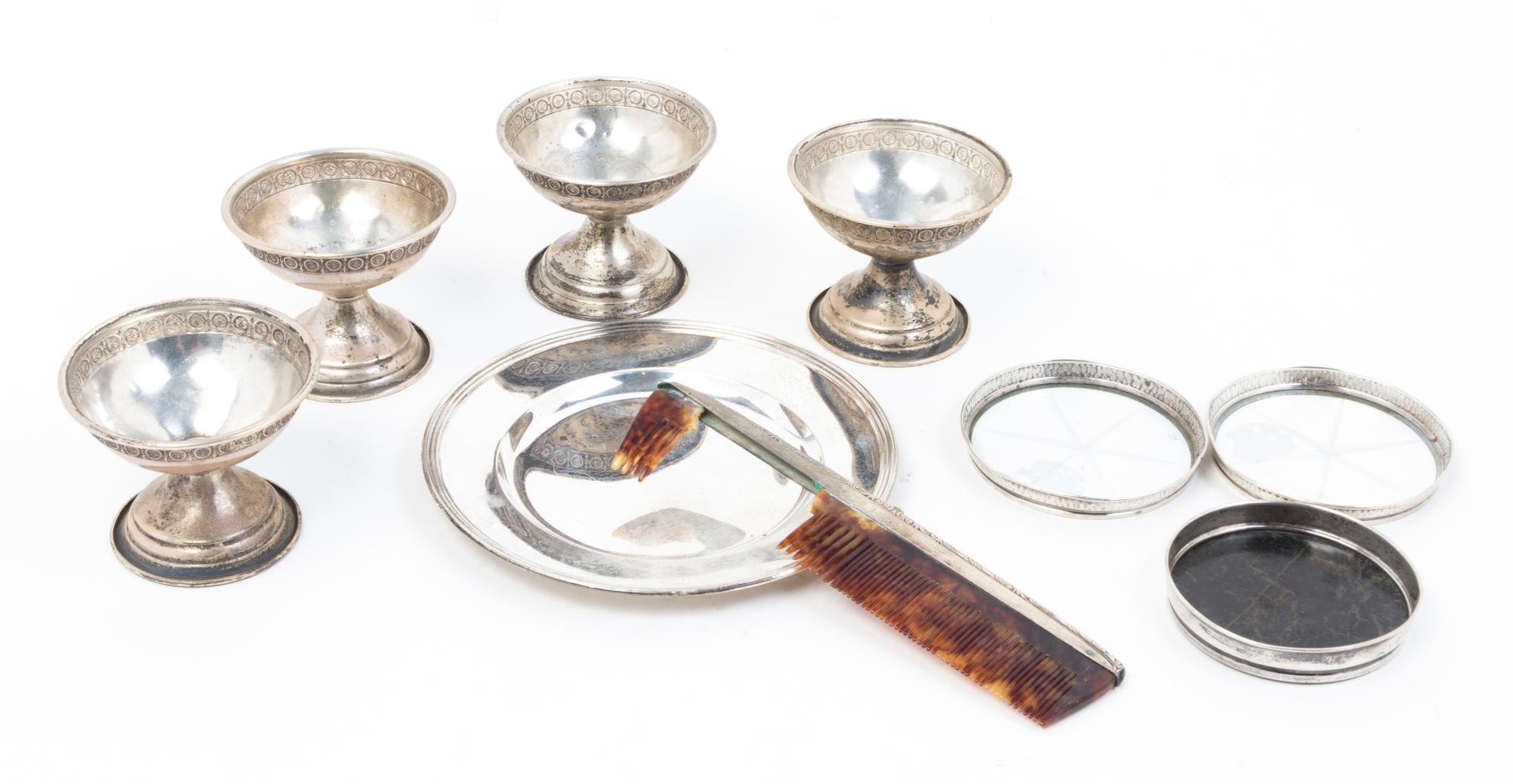 A Group of Nine Silver Articles, , comprising four dessert cups, three coasters, a small dish and a silver and tortoise shell comb.
