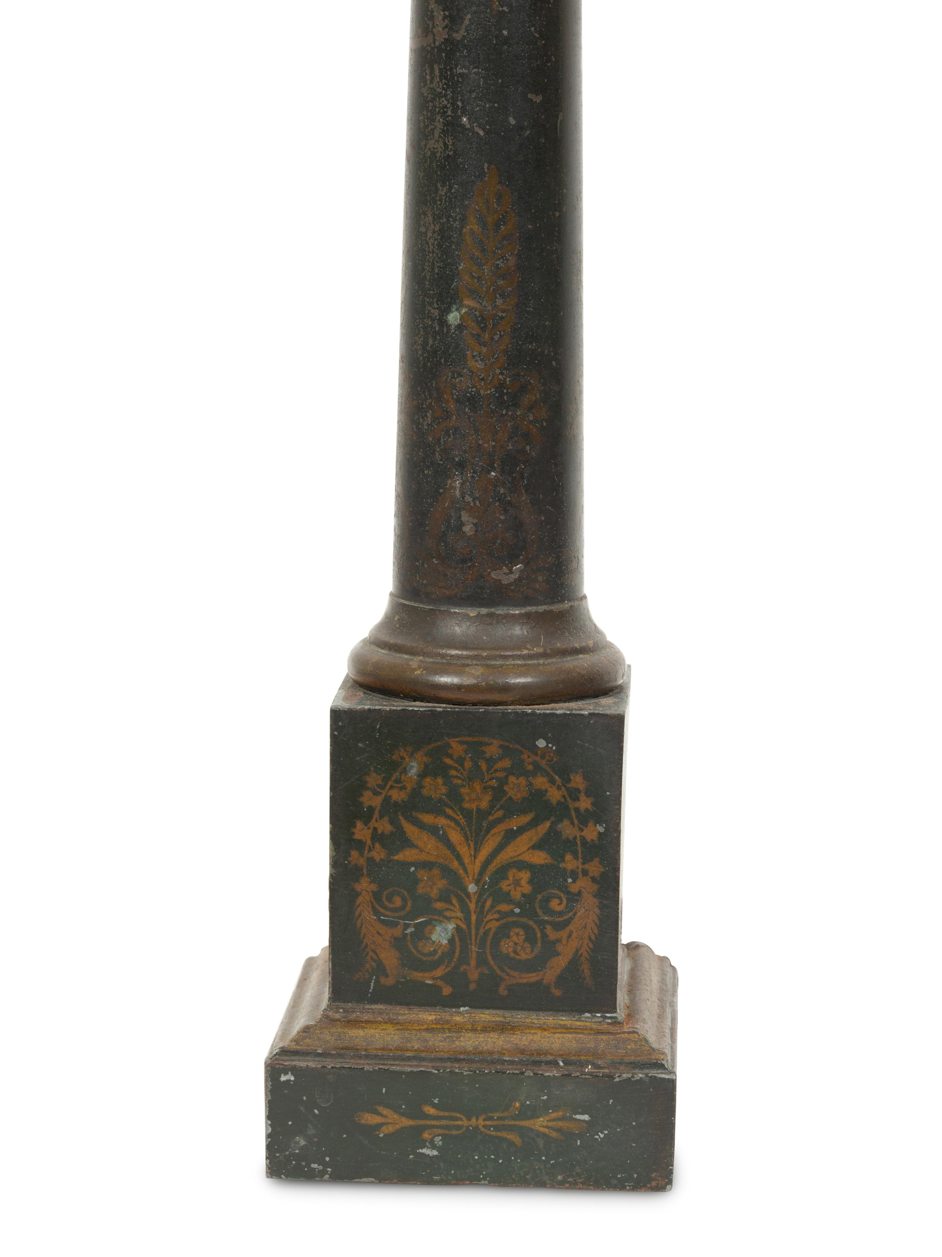 A Pair of Regency Style Ebonized and Gilt Tole Table Lamps