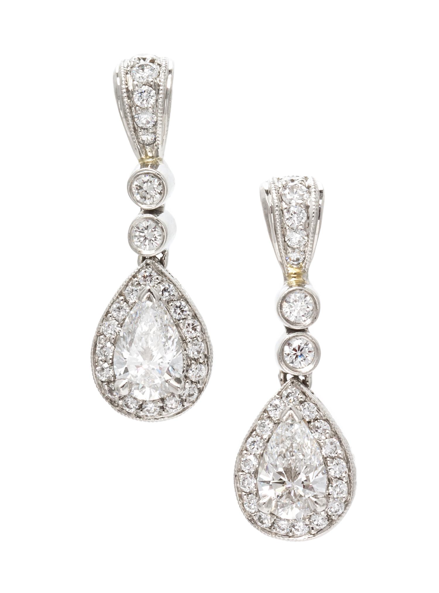A Pair of Platinum and Diamond Ear Pendants, Michael Beaudry, 4.25 dwts.