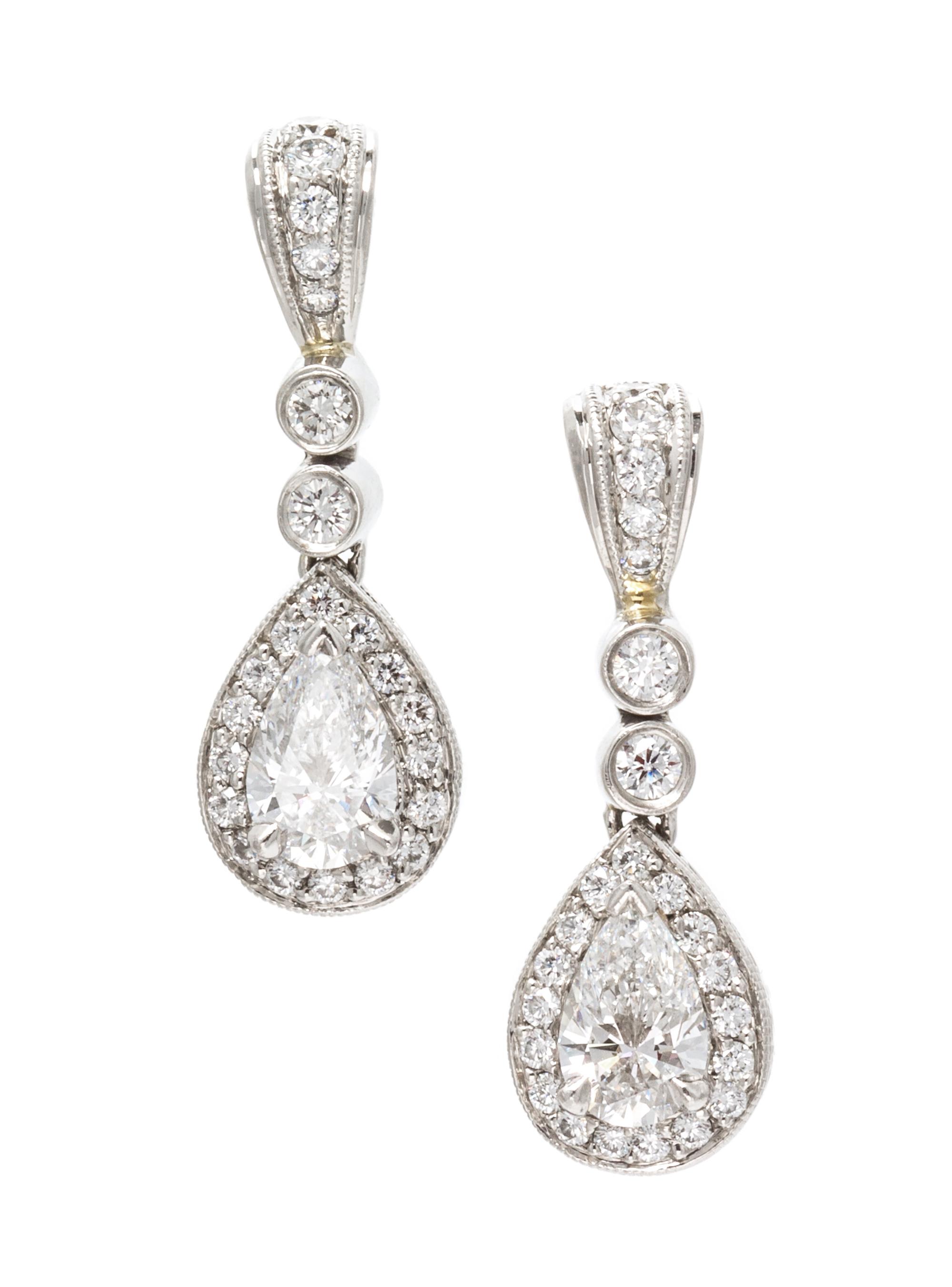 A Pair of Platinum and Diamond Ear Pendants, Michael Beaudry, 4.25 dwts.