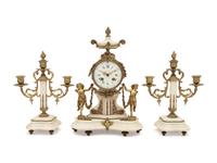 A Louis XVI Style Gilt Metal Mounted Marble Clock Garniture