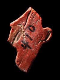 An Egyptian Red Jasper Face Inlay