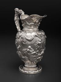 An American Baroque Style Repousse Silver Pitcher