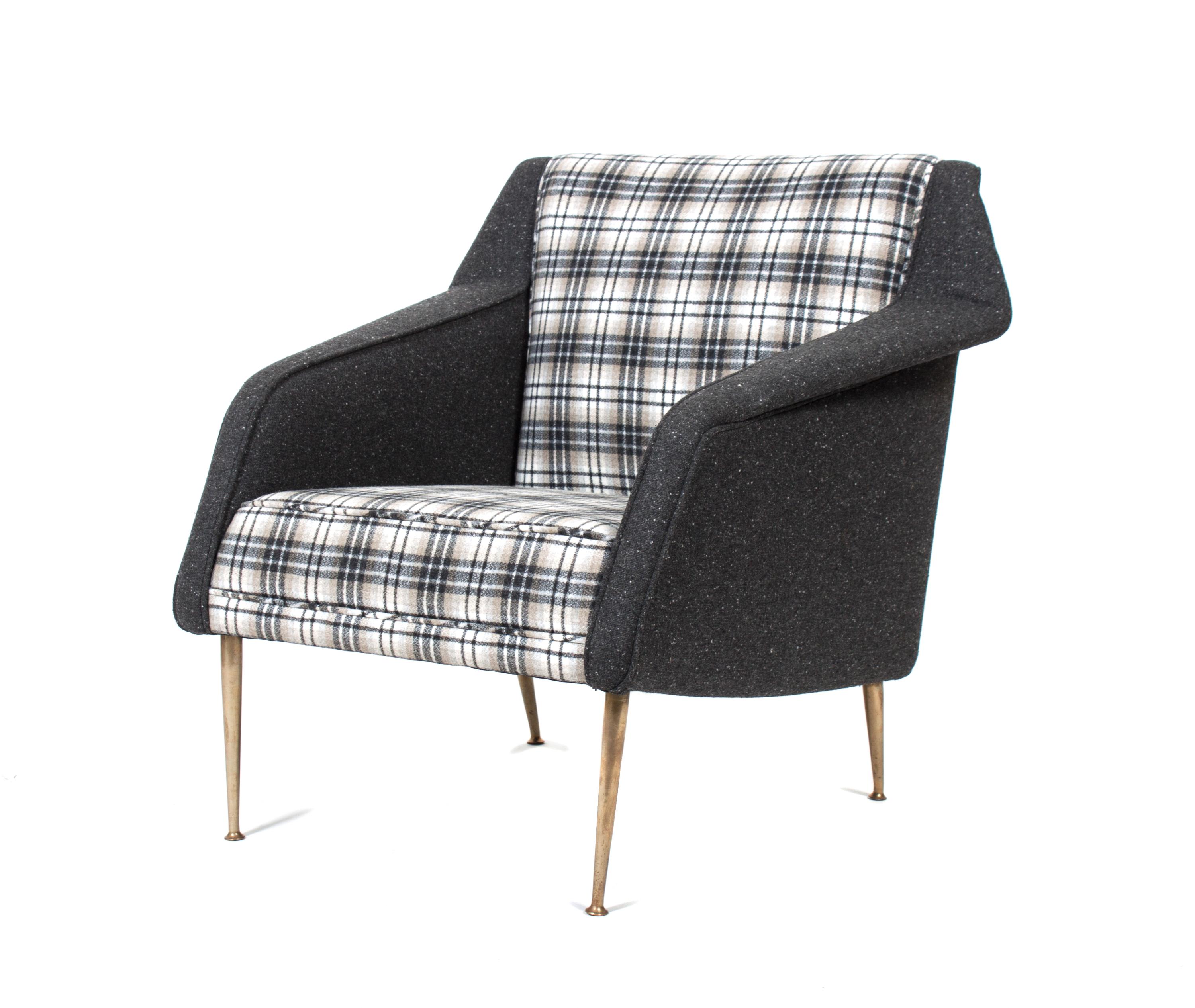 An Upholstered Armchair Height 29 1/2 inches. — 20TH CENTURY