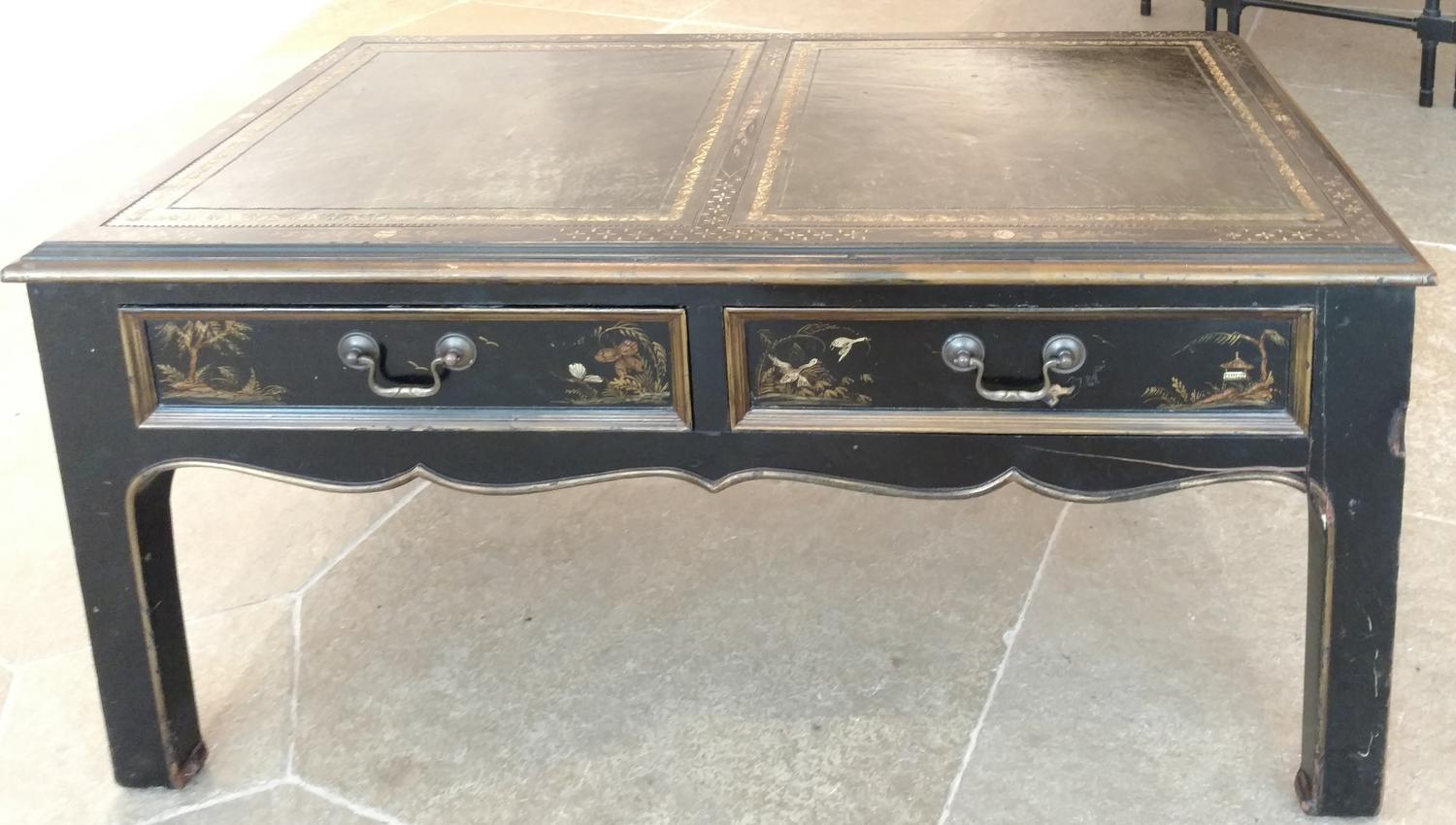 A Table with Leather Inset Top Height 16 1/2 x width 35 x depth 19 inches.