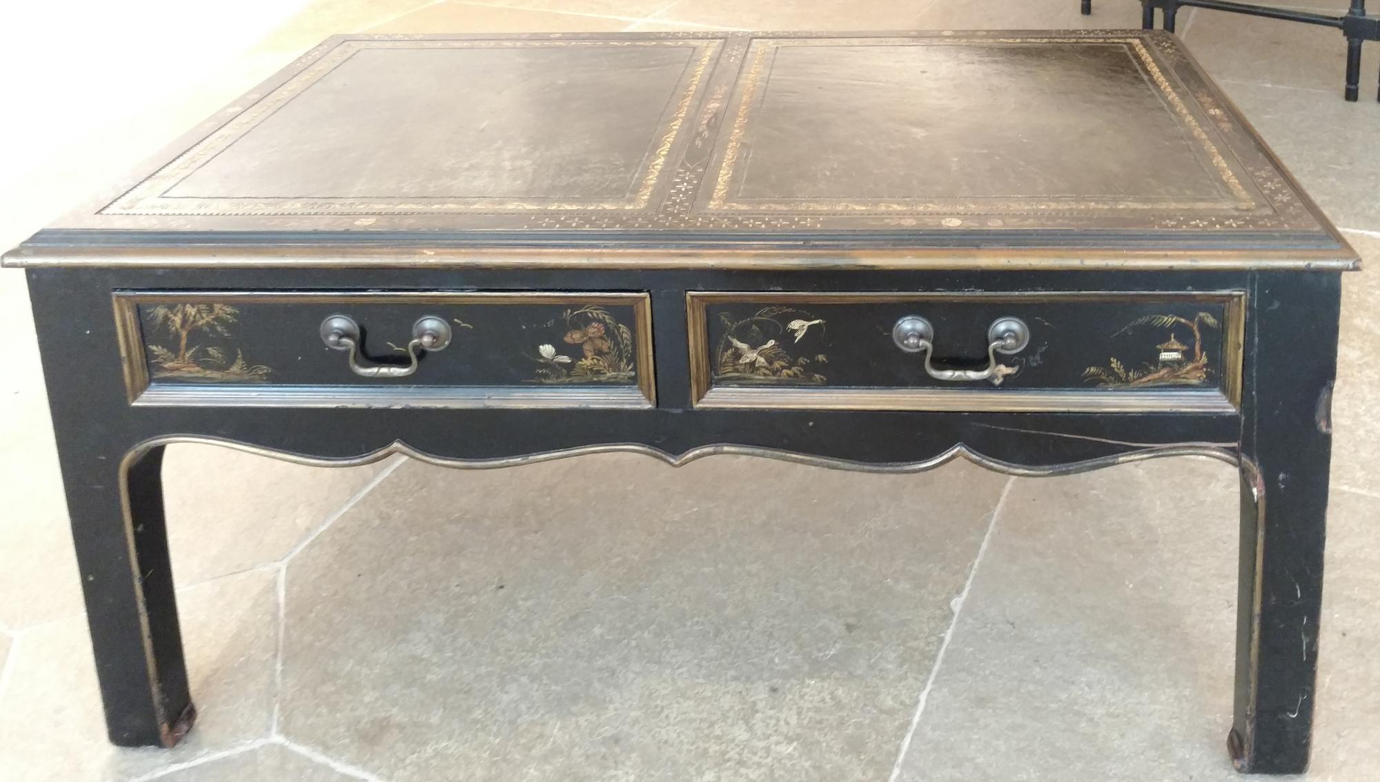 A Table with Leather Inset Top Height 16 1/2 x width 35 x depth 19 inches.