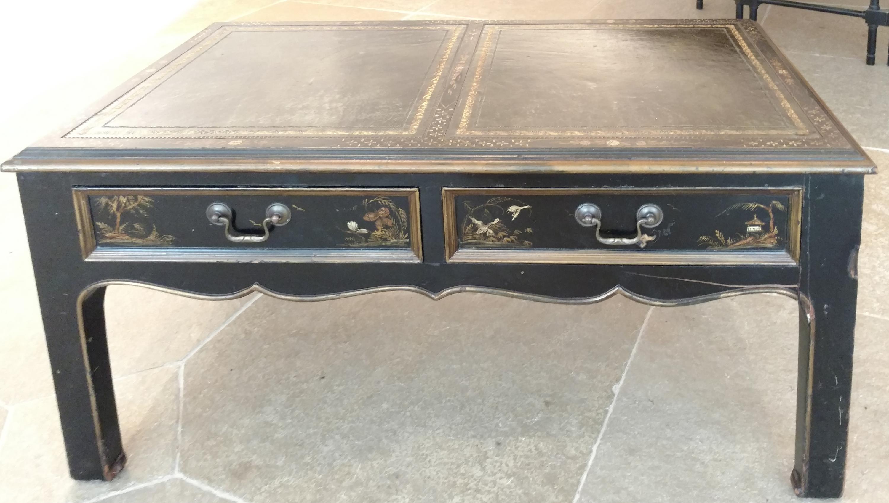 A Table with Leather Inset Top Height 16 1/2 x width 35 x depth 19 inches.