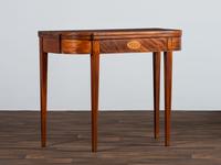 A Federal Figured and Floral Inlaid Mahogany Game Table